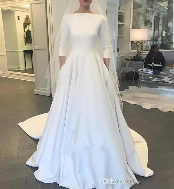 Meghan Markle Style A Line Vestidos de novia elegantes Bateau Neck Mangas largas Barrido de tren Botones cubiertos Volver Vestidos de novia