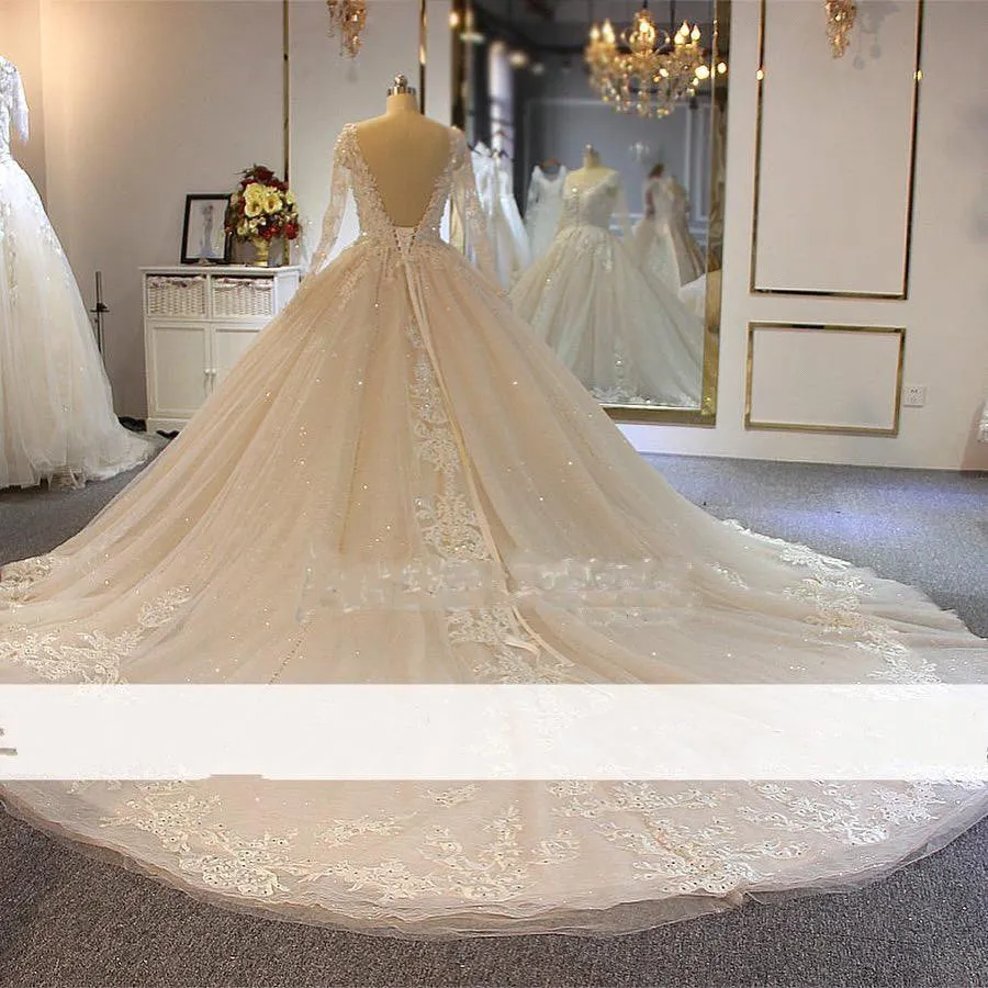Long Sleeves Tulle Sheer Jewel Beading Ball Gown Wedding Dress