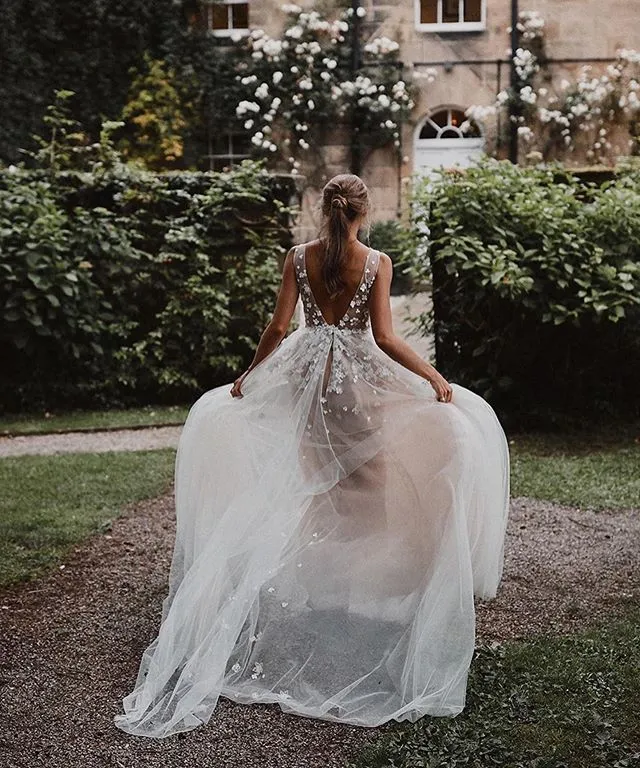 Bohemian Lace Applique a line wedding dress with V-Neck and Sweep Train - 2020 New Arrival