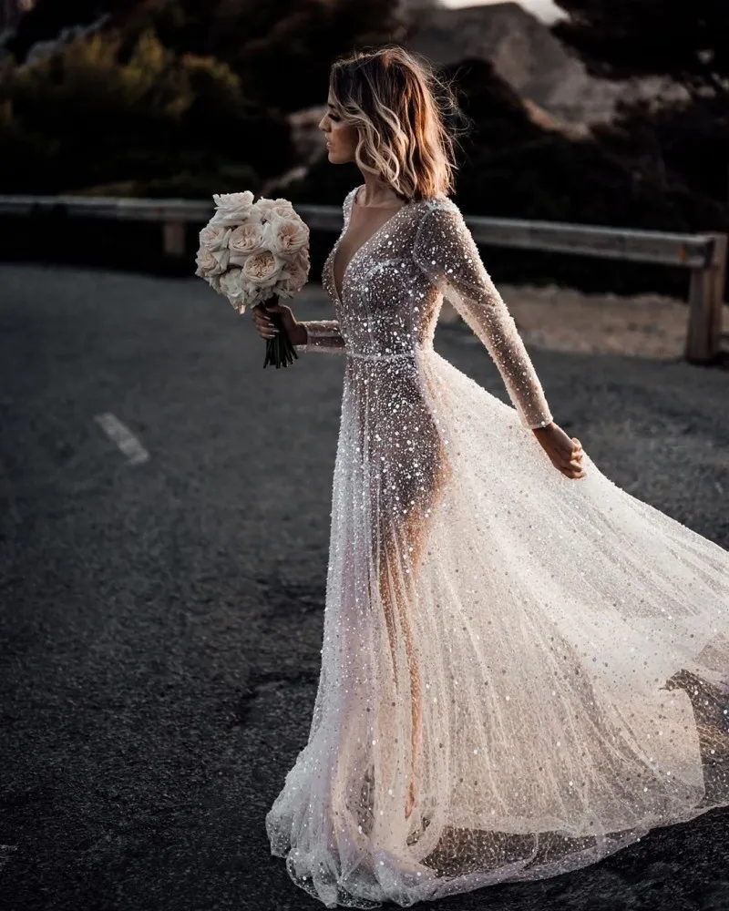 Boho Sequin Beaded Deep V-Neck glitter wedding dress with Backless and Long Sleeves - Perfect for Beach Weddings Boho Sequin Beaded Deep V-Neck glitter wedding dress with Backless and Long Sleeves - Perfect for Beach Weddings
