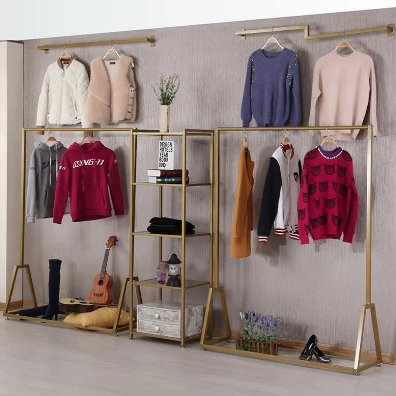 Espositori per negozi di abbigliamento Mobili per camera da letto tipo pavimento oro Appendiabiti decorazione scaffale negozio di stoffa da donna