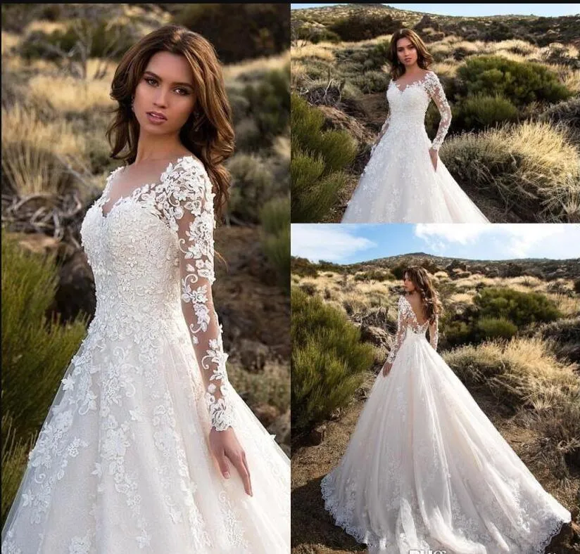 Splendidi abiti da sposa a maniche lunghe con illusione trasparente avorio scollo a V Abiti da sposa in tulle sexy senza schienale in pizzo Robe De Mariage 2019 Nuovo arrivo