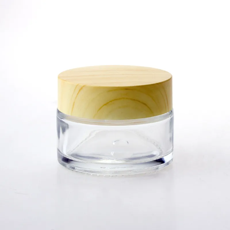 5g 10g 15g 30g 50g 100g vasetti cosmetici in vetro vuoti confezione vasetto per crema in vetro con tappo in venatura del legno all'ingrosso