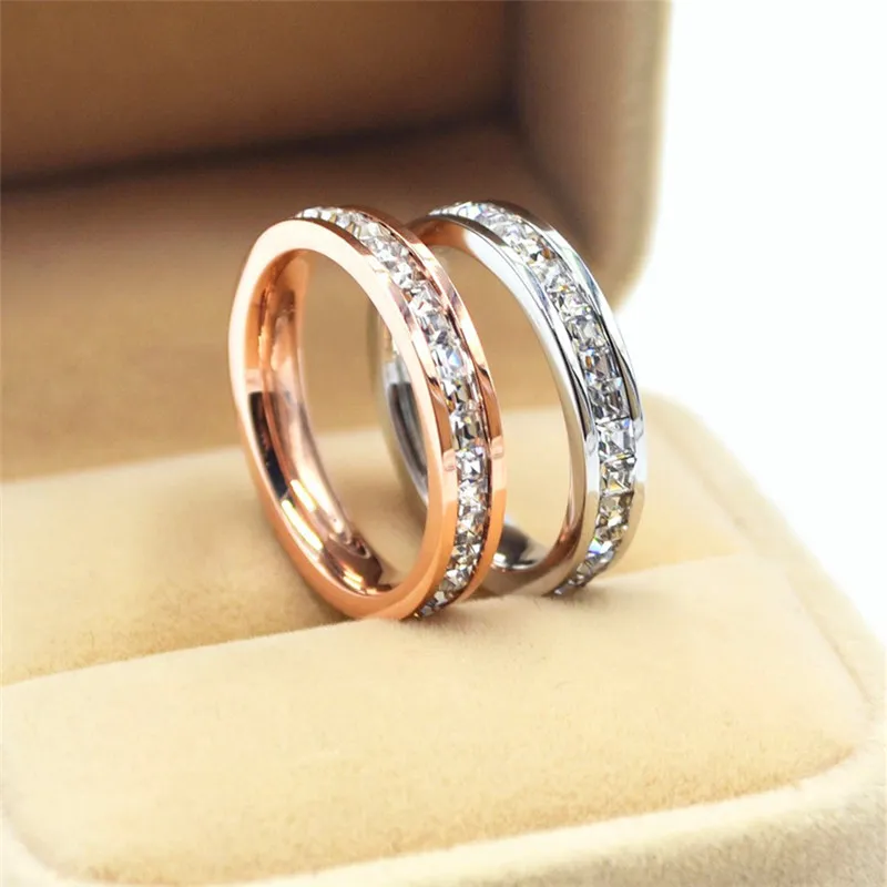 Anelli in acciaio al titanio maschio femmina oro rosa argento Moda zircone bianco gioielli in cristallo promessa anello di fidanzamento per le donne