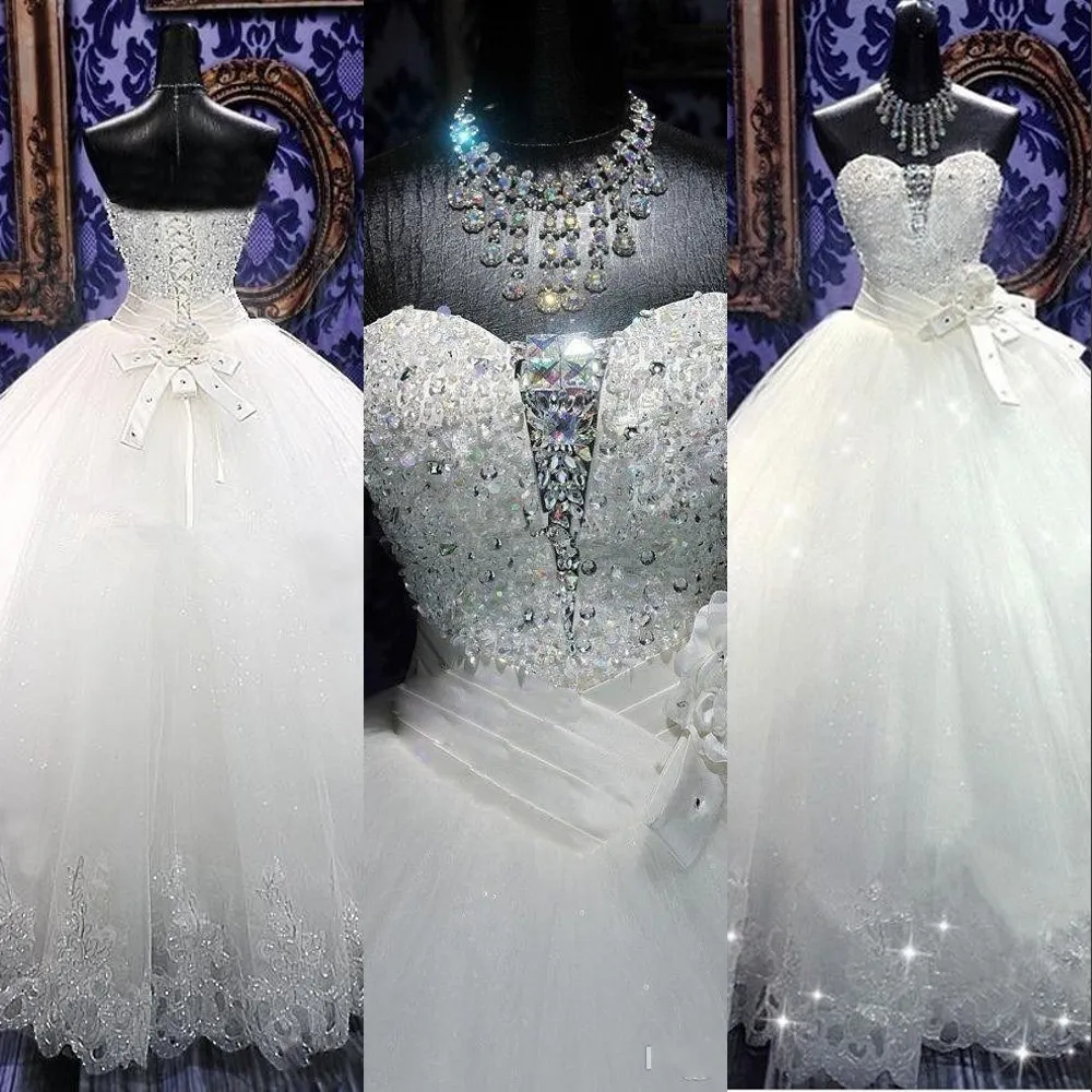 Abiti da sposa economici vintage Bling Una linea Sweetheart senza maniche Applicazioni in pizzo Perle di perline di cristallo Abiti da sposa formali con fiocco fino al pavimento