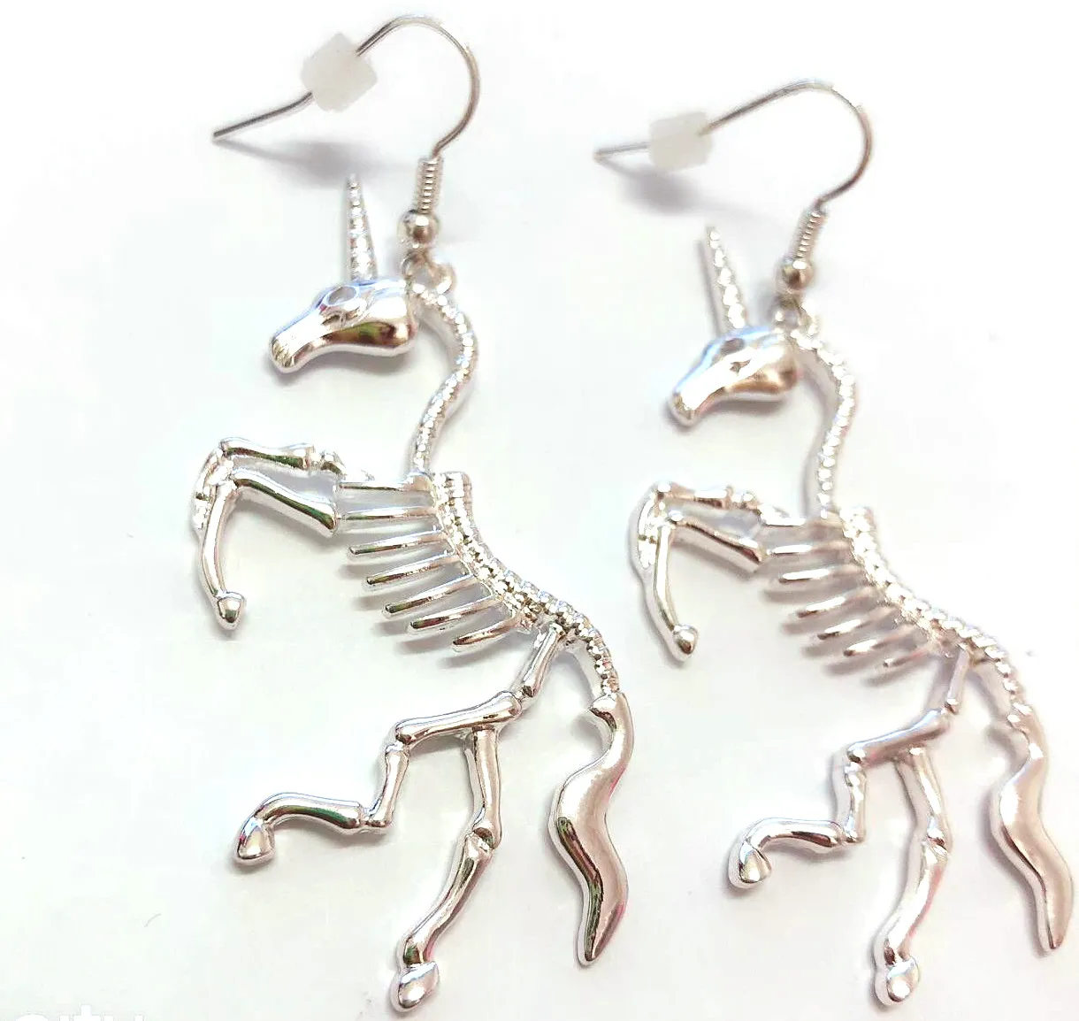 Unicorn skeleton deals earrings