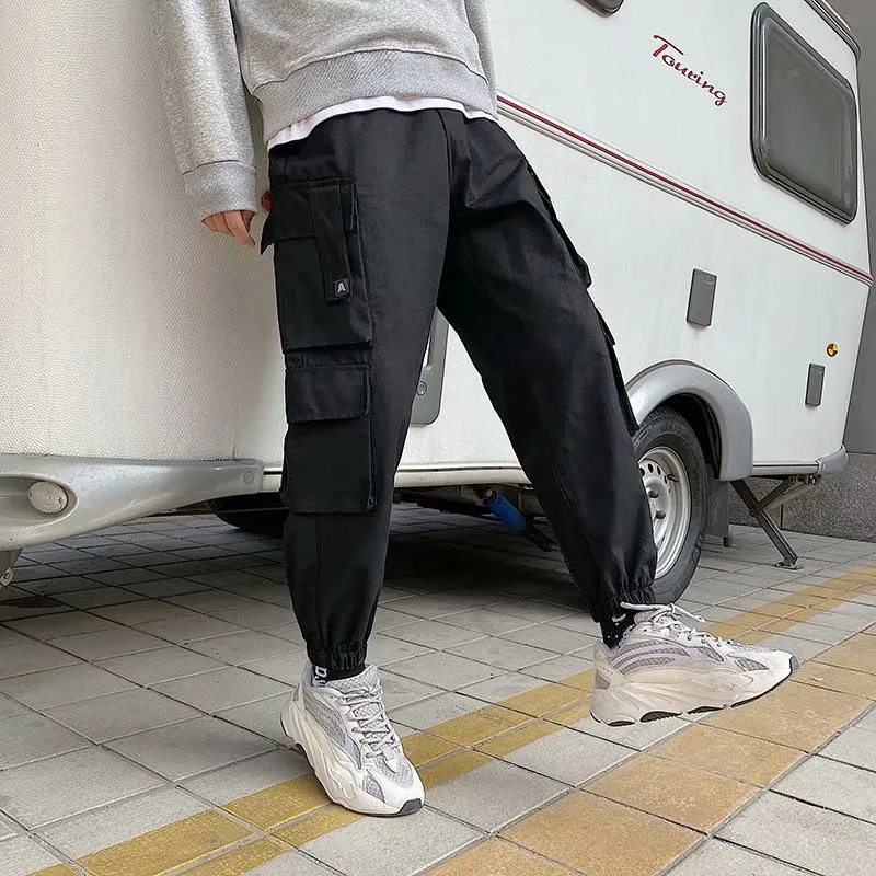 Mens Pantaloni Cargo 2020 di Nuovo Modo di Strada Abbigliamento Ragazzo Tasche Multiple Pantaloni Cargo Allentati Casual Harajuku Jogging Pantaloni