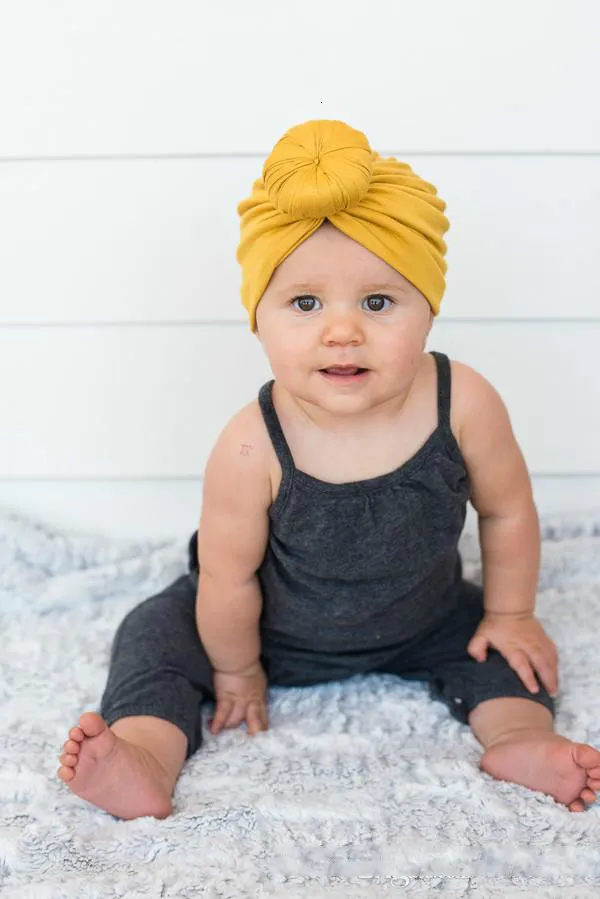 Modische niedliche Säuglingsbaby-Kind-Kleinkind-Kinder Unisex-Ball-Knoten-indischer Turban bunter Frühlings-niedlicher Baby-Donut-Hut einfarbige Baumwolle WL1198