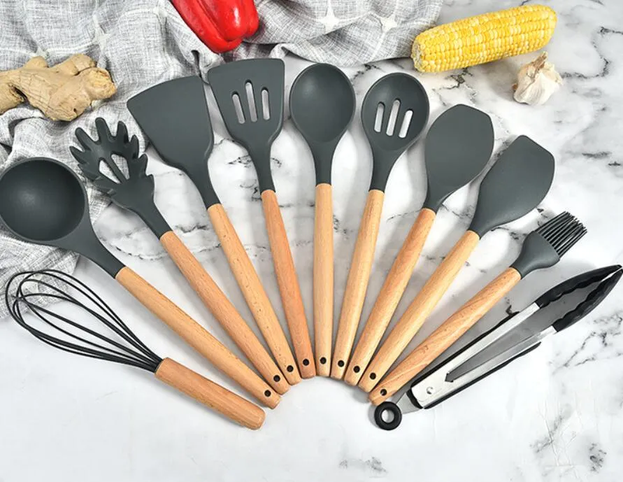 Utensili da cucina in silicone con manico in legno 11 set di utensili da cucina Cucchiaio da cucina da 11 pezzi e set di pale vendite dirette in fabbrica