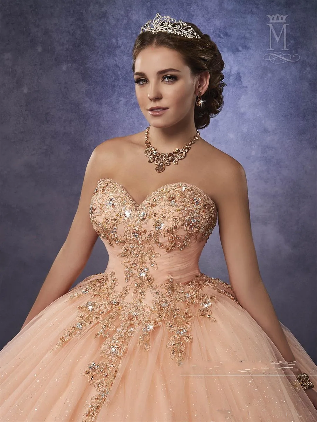 Peach and gold quinceanera on sale dresses