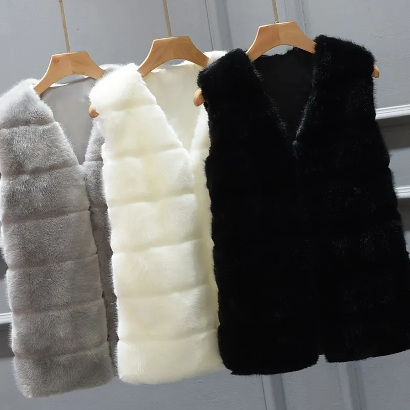 Ny Faux Fur Vest Jacka Coat Kvinnor Vinter Varm Ytterkläder Overcoat Parka Ärmlös V-Neck Kort Waistcoat Plus 4x 6Q2305