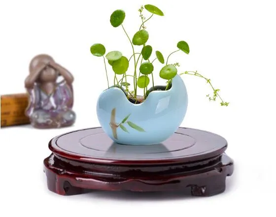 Can rotate imitate solid wood woodiness round base flowerpot aquarium handicraft solid wood to place a piece