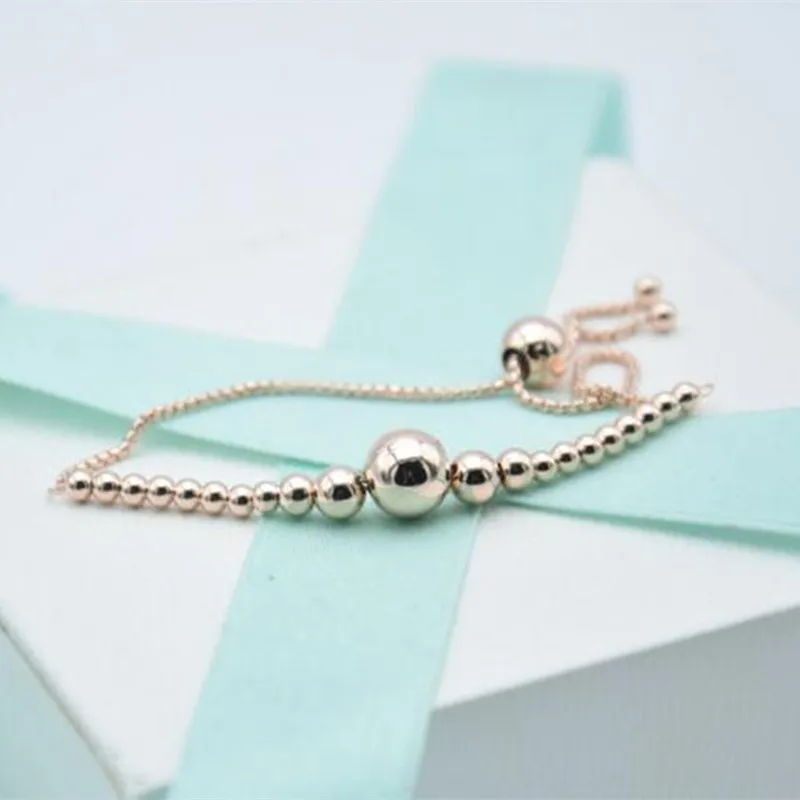 String of shop beads slider bracelet