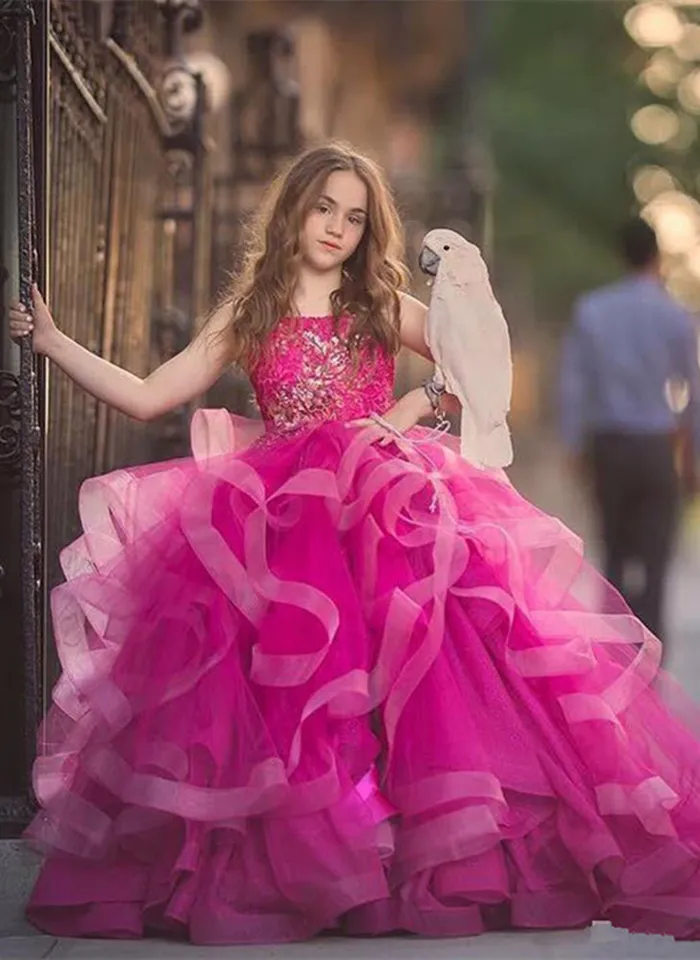 2020 Splendidi abiti da ragazza di fiori con volant a cascata Fluffy Tulle Pageant Festa di compleanno Applique Abito da principessa Abiti da prima comunione