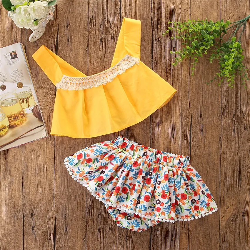 Baby flicka kläder 2st 2019 sommar casual spädbarn toddler tjej gul tassel ärmlös topp + blommig kjol barn outfits set baby boutique