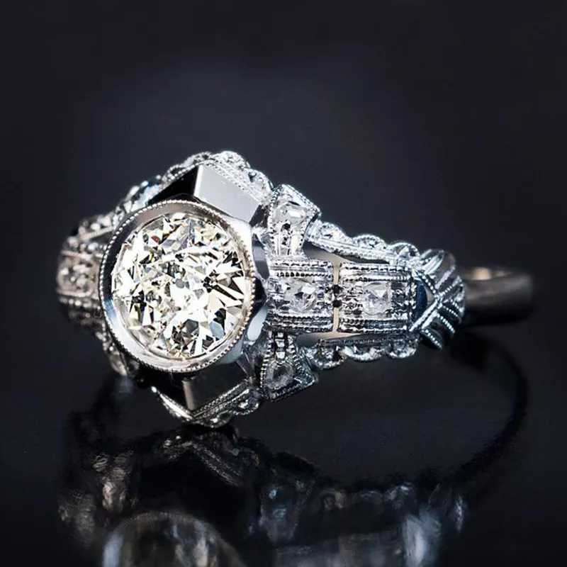Klassischer hohles Design geschnitzter runder Zirkonium-Diamant-weiblicher Ring, europäischer Retro- Stil Kupfer-plattierter Silberring