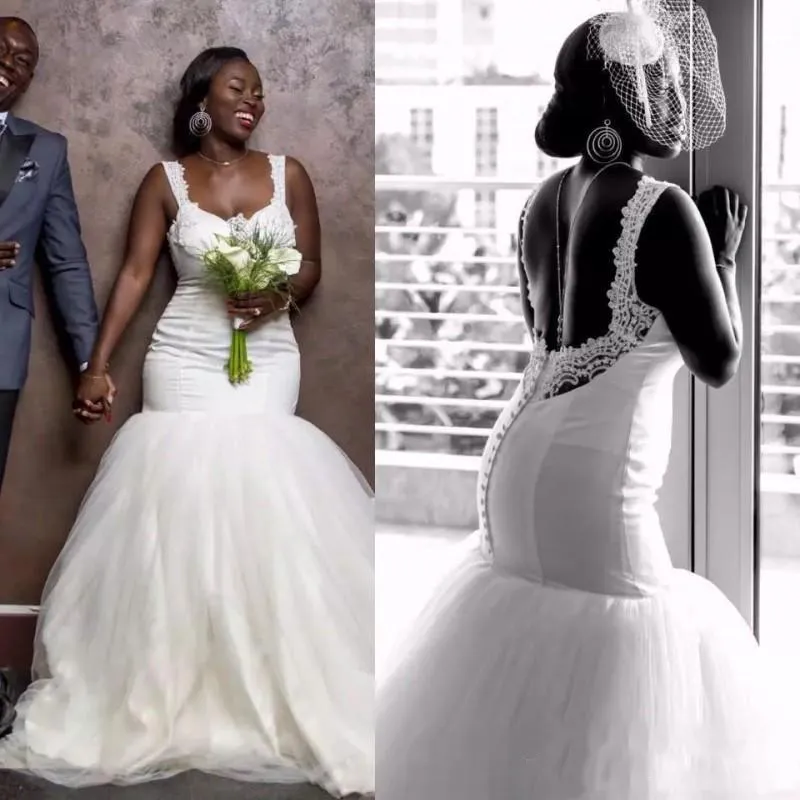 2019年の長いアフリカのMermiadのウェディングドレスのレーススパゲッティストラップ背中のないセクシーな結婚式のブライダルガウンプラスサイズ