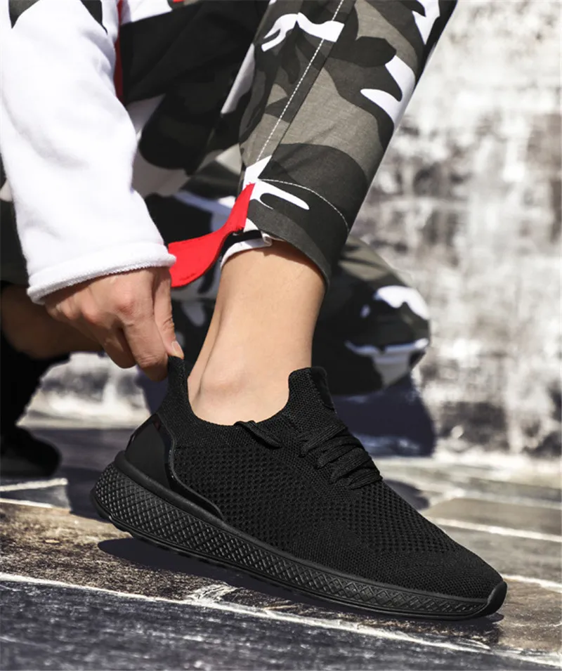 Wholesale 2019 summer new sports shoes men s trend breathable large size sports shoes running flying men s shoes