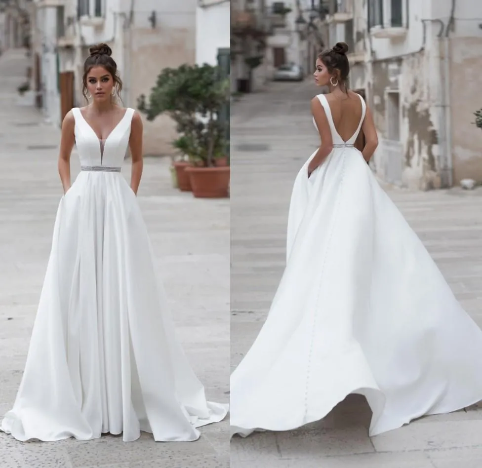 Simple Une Ligne D'été Robe De Mariée Avec Des Poches Sexy Dos Nu Sans Manches Ceinture Perlée Plage Jardin Robe De Mariée Robes De Mariee