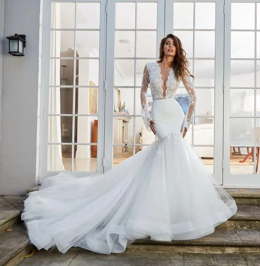 2020 White Mermaid wedding attendee dress with Detachable Train, Lace  Applique, Long Sleeves, Deep V-Neckline, and African Plus Size Bridal Gown