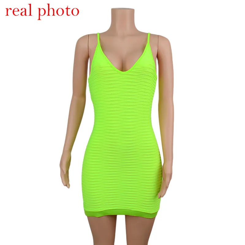 neon lime ruched front strappy bodycon dress Sleeveless Twist Cut Out Front Mini Bodycon Dress In Lime Green Slinky | EGO US