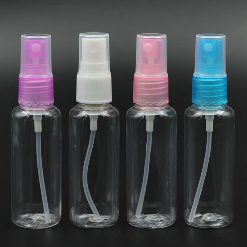 50 unids/lote 40ML tapa multicolor cilindro bomba de pulverización botella de Perfume para PET botellas de agua de Color sólido contenedores Spray de Perfume