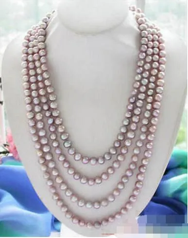 Un long collier de perles de culture d'eau douce rondes lavande de 100 "10 mm