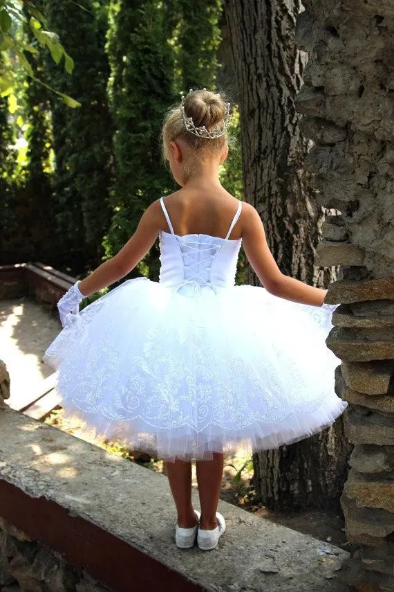 Lovely Lace Applique Flower Girl girls White dress with Spaghetti Straps and Beading for Weddings, Birthdays, and Pageants Lovely Lace Applique Flower Girl girls White dress with Spaghetti Straps and Beading for Weddings, Birthdays, and Pageants
