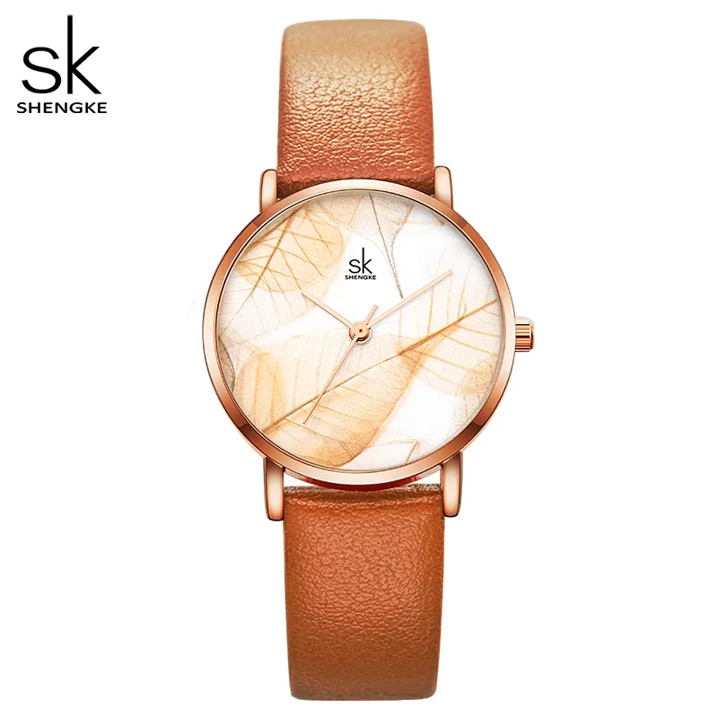 Shengke New Women Women Folhas Criativas Dial Disque Bright Leather Quartz Clock Fashion Casul Ladies Wristwatch Montre Femme