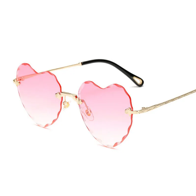 Moda sem aro óculos de sol mulheres novo formato Chegada do amor do coração eyewear feminina boa qualidade óculos de sol UV400 Viagens Shopping