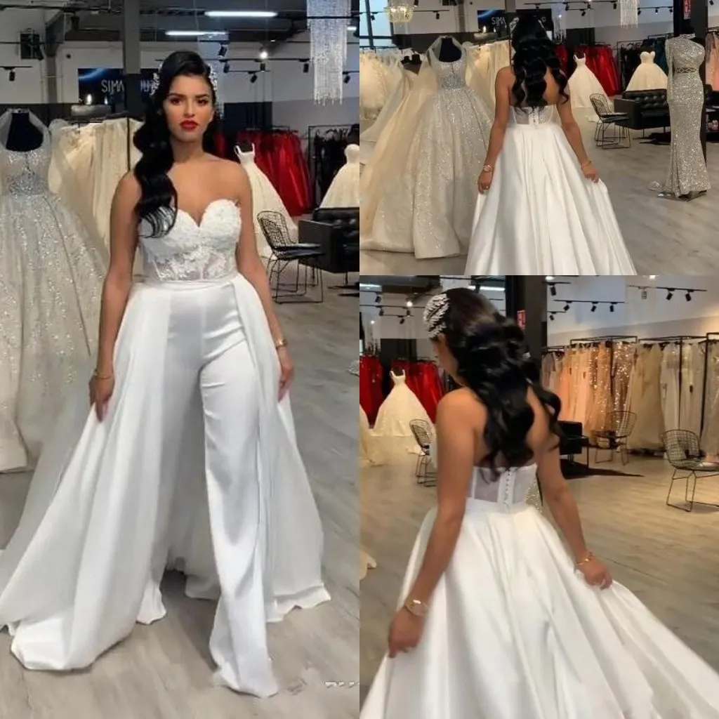 Witte jumpsuits sexy afneembaar een lijn trouwjurken lieverd kanten satijn met overskirts bruidsjurken broek jurk Vestidos de novia