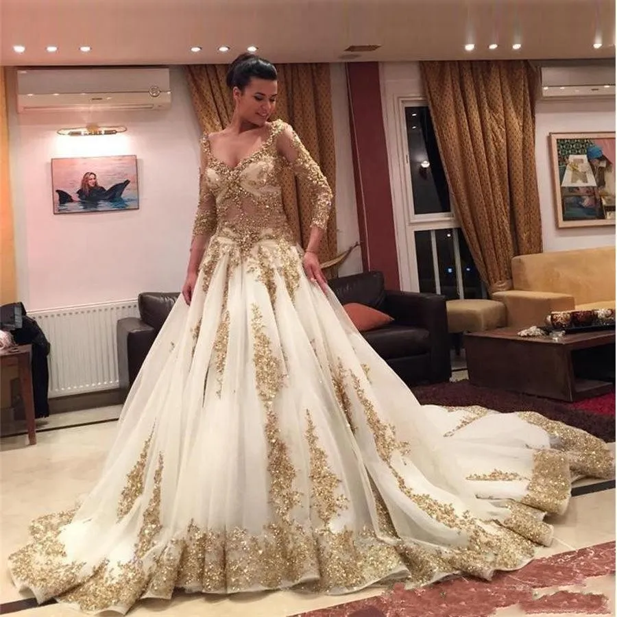 Gold Applique Lace A Line Wedding Gowns with V-Neck, Long Sleeves, Beaded Illusion Cathedral Train - Plus Size Bridal Gown