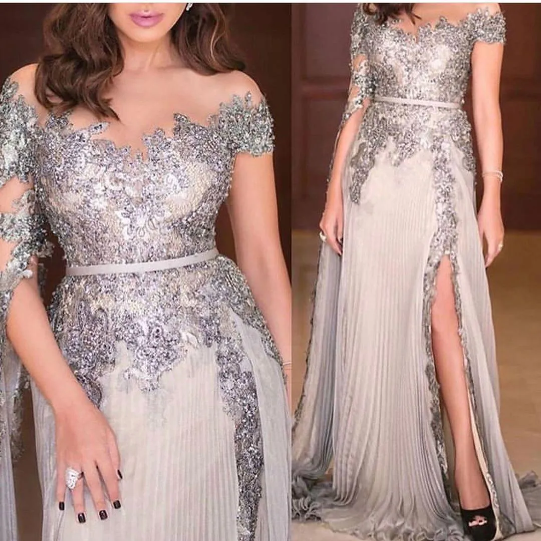 2020 Modest Silver Prom Dresses Long Sleeves Sheer Neck Lace Applique Sequins Beaded Side Slit A Line Ruched Pleats Evening Party Gowns