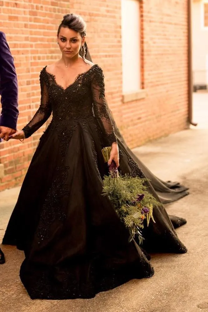 black wedding dress lace V Neck Long Sleeve Chapel Train Floral appliques trims the deep V neckline and square lace up back V Neck Long Sleeves Black