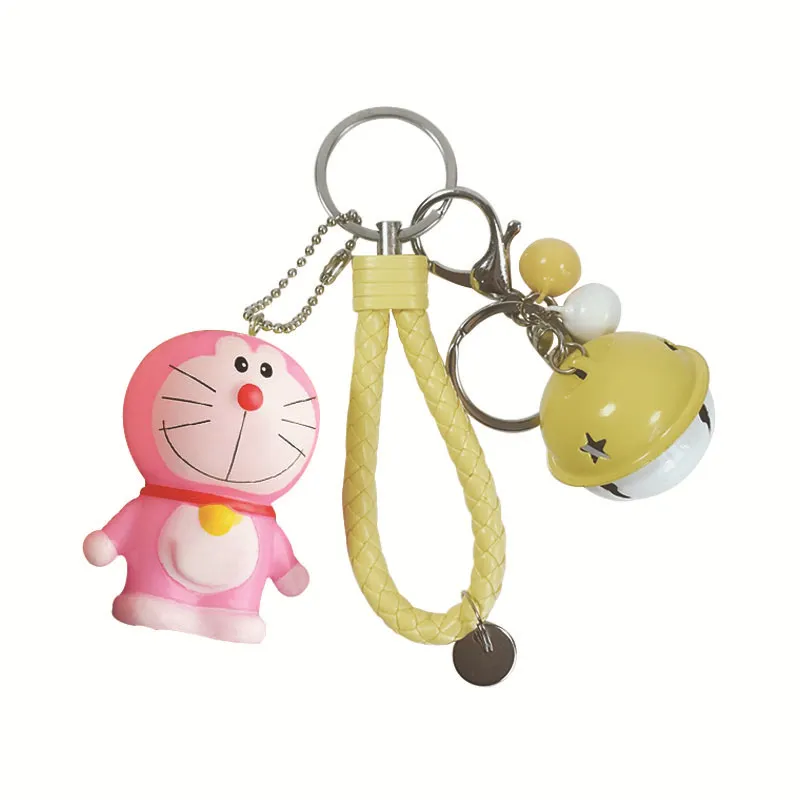 Söt tecknad pvc doraemon keychain armband bell bil nyckelkedja för kvinnor väska charm nyckelring smycken barn leksaker fest