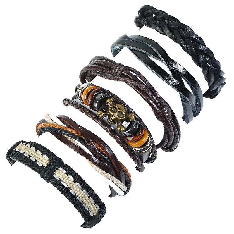 Pulsera de cuero tejido Aleación Cabeza de calavera Cuentas de madera Encantos Metal Joyería europea americana para mujeres Cadena de cuerda de mano antigua Brazalete envolvente para hombre