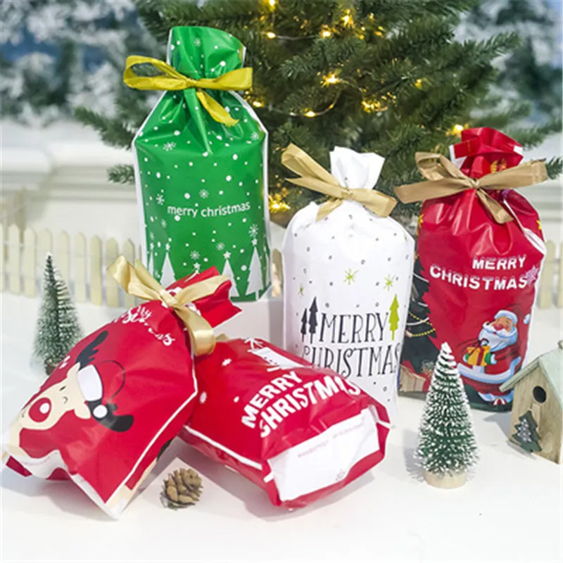 Bolsa de dulces de Navidad 50 UNIDS Feliz Año Nuevo Navidad Fiesta de cumpleaños Cordón Dulces Galletas Hornear Presente Bolsas de regalo