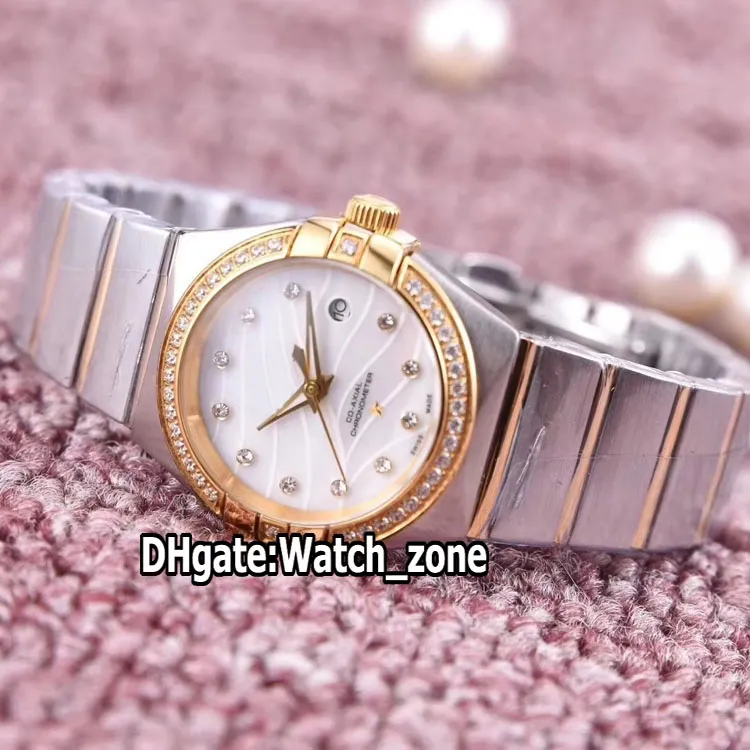 新しい星座123.25.27.20.55.005ホワイトコングダイヤルNH05自動女性の腕時計ダイヤモンドベゼル2トーンゴールドスチール製ブレスレットの腕時計。