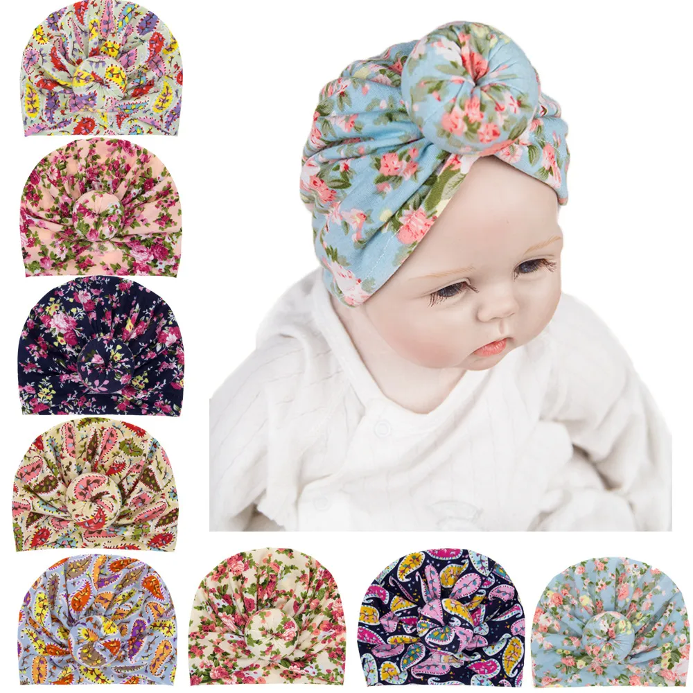 Europa Infantil Bebé Niñas Sombrero Nudo Flor Sombreros Niño Niño Niños Gorros Turbante Donuts Florales Sombreros Accesorios para niños 8 colores 15016