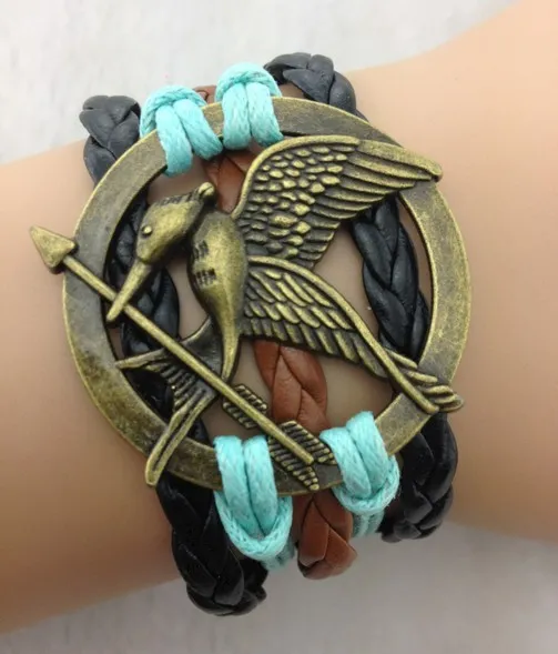 Amazon.com: Today's Loot Hunger Games Mocking Jay Bird Braided Bracelet -  Brown and Black: Clothing, Shoes & Jewelry