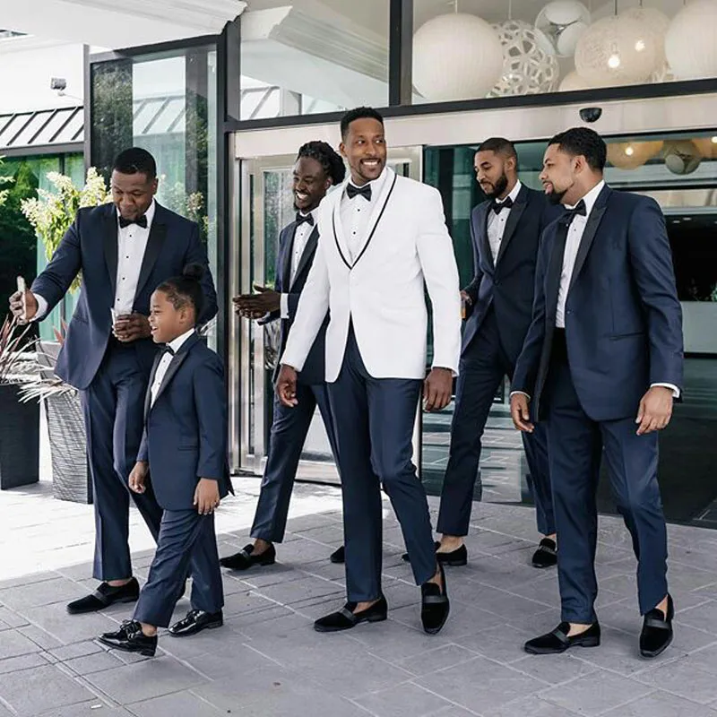 White tux deals groomsmen