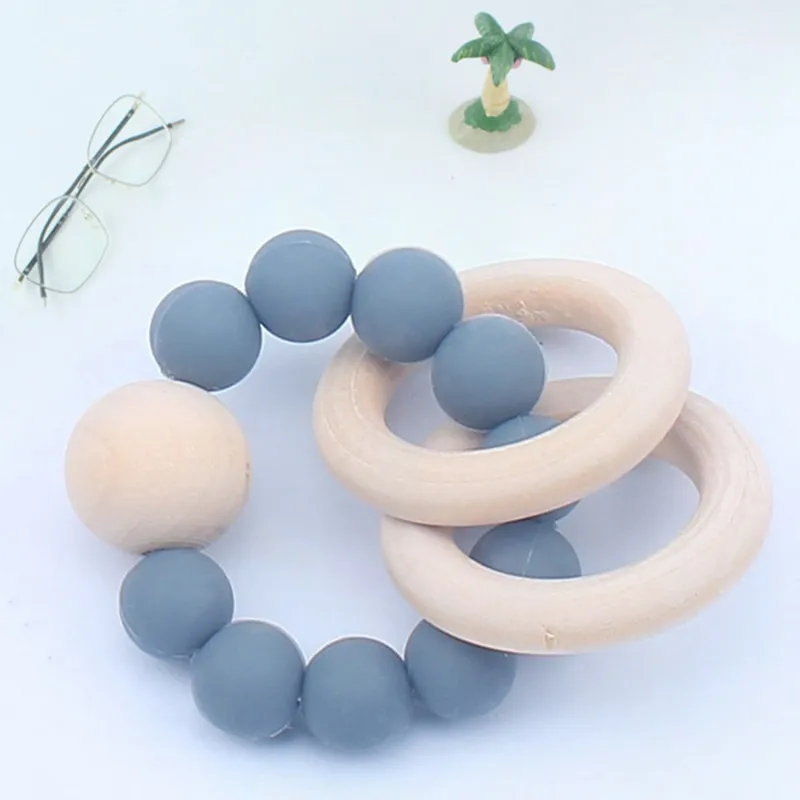 아기 나무 Teether 팔찌 실리콘 씹는 구슬 Teething 나무 딸랑이 장난감 아기 Teether Soother 팔찌