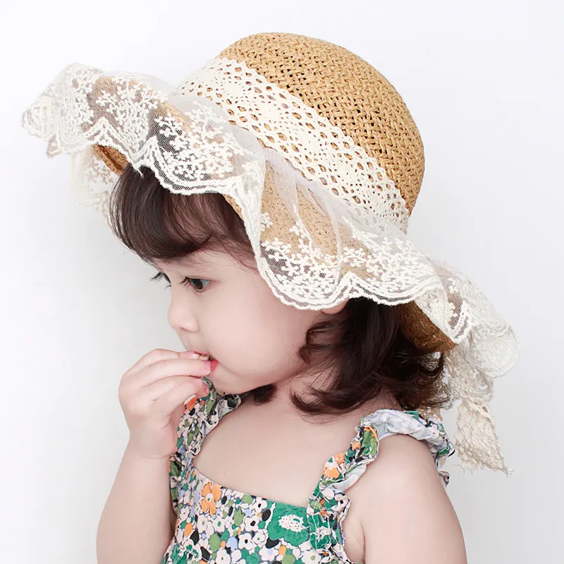 Enfants paille chapeaux de soleil fille dentelle perle été chapeau de soleil dentelle Bowknot respirant adulte enfants herbe tresse large bord chapeaux parent-enfant casquette S141