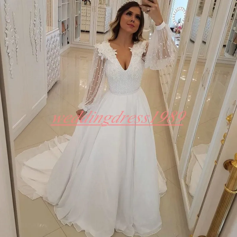 Impressionante Praia Applique Beads Vestidos de Casamento Manga Longa Ilusão Juliet Plus Size Saudita Africano Vestidos de Noiva Bola Formal Custom Made