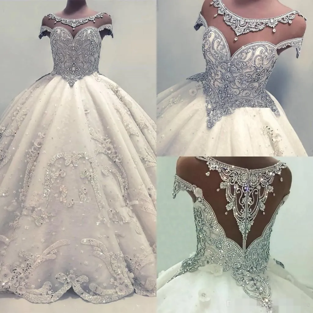 Crystal Ball Dresses Beade Sheer Neck Illusion Back Lace Applique Handmade Flowers Chapel Cap Sleeves Wedding Gown