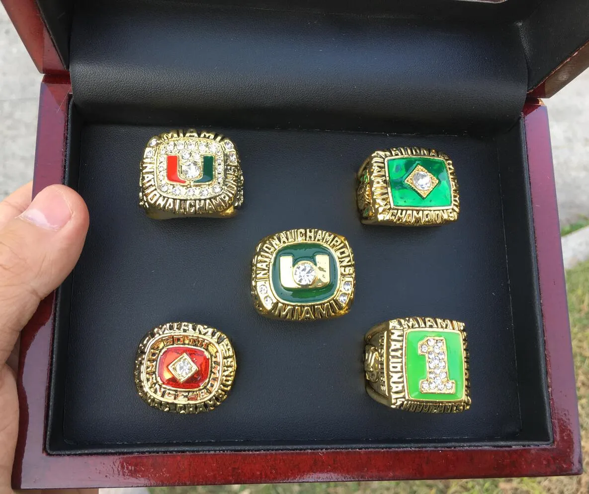 5 Pcs 1983 1987 1989 1991 2001 Miami Hurricanes National Championship Ring Set Avec Présentoir En Bois Case Fan Cadeau 2019 Drop Shipping