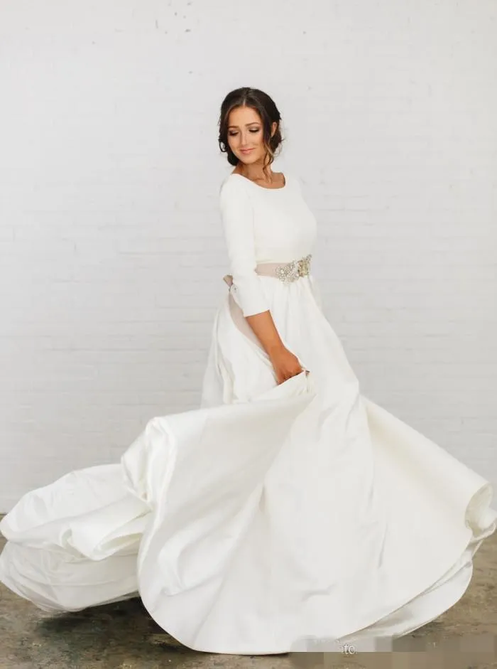 Neueste Country-Kleider Dusty Rose Ribbon Sash Crystal Beaded Simple Backless Long Sleeves Wedding Gown Hochzeitskleid
