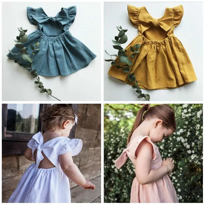 Bébé Filles Vêtements Enfants Retour Bouknot A-ligne Robes Coton Lin À Volants Princesse Robe D'été Fly Manches Vacances Robe Tutu Robe AYP556