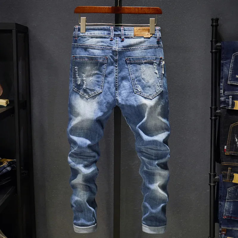 2018 Nya m￤ns jeans rippade h￥l koreansk stil elasticitet avslappnad byxor coola stretch man denim byxor v￥r c19042201