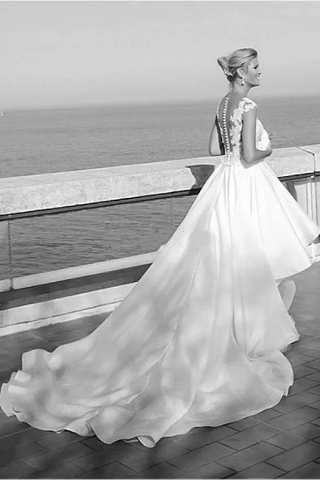 Vestidos de novia cortos de enfrente 2025
